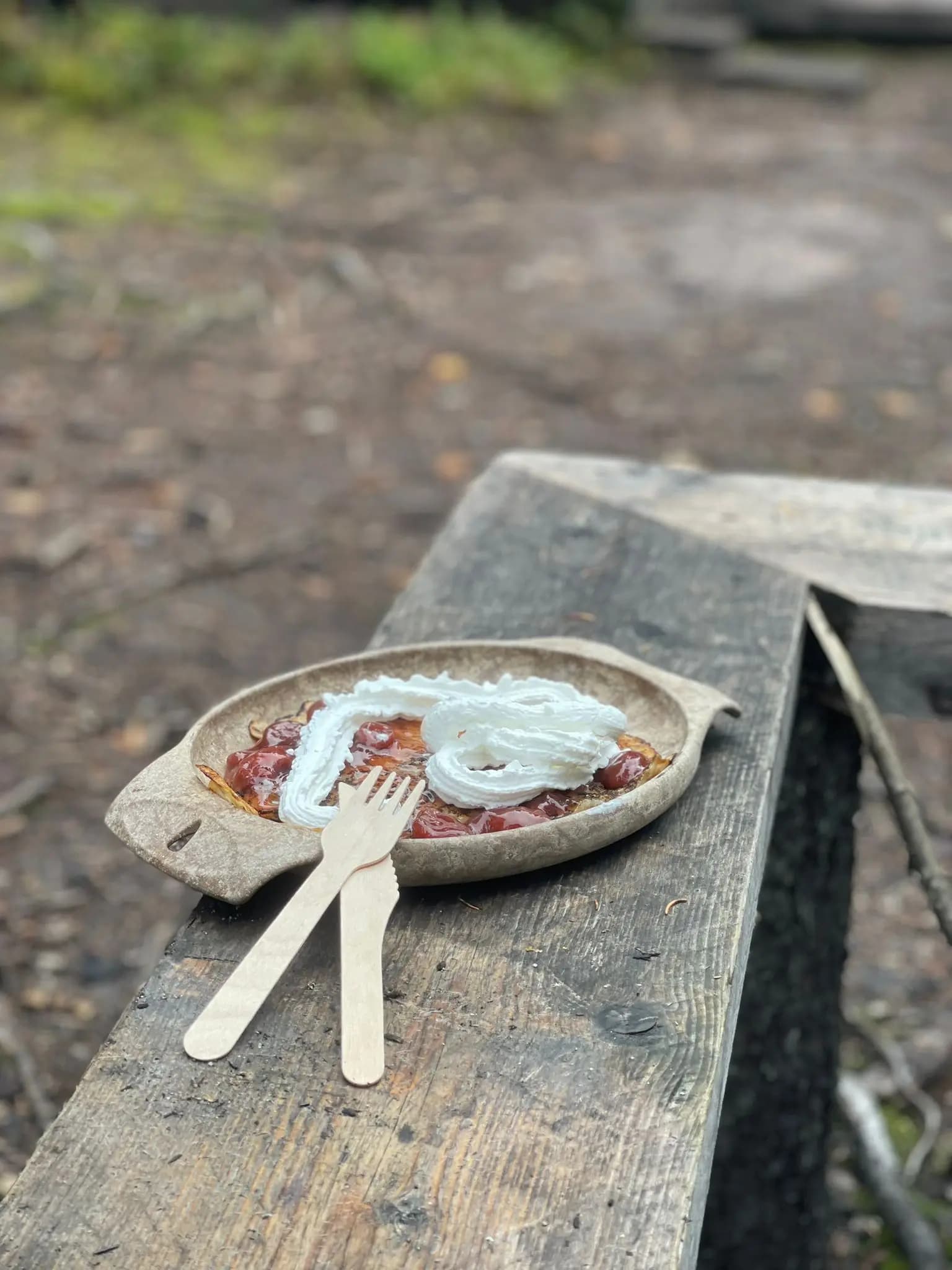 Crepes with jam and whipped cream