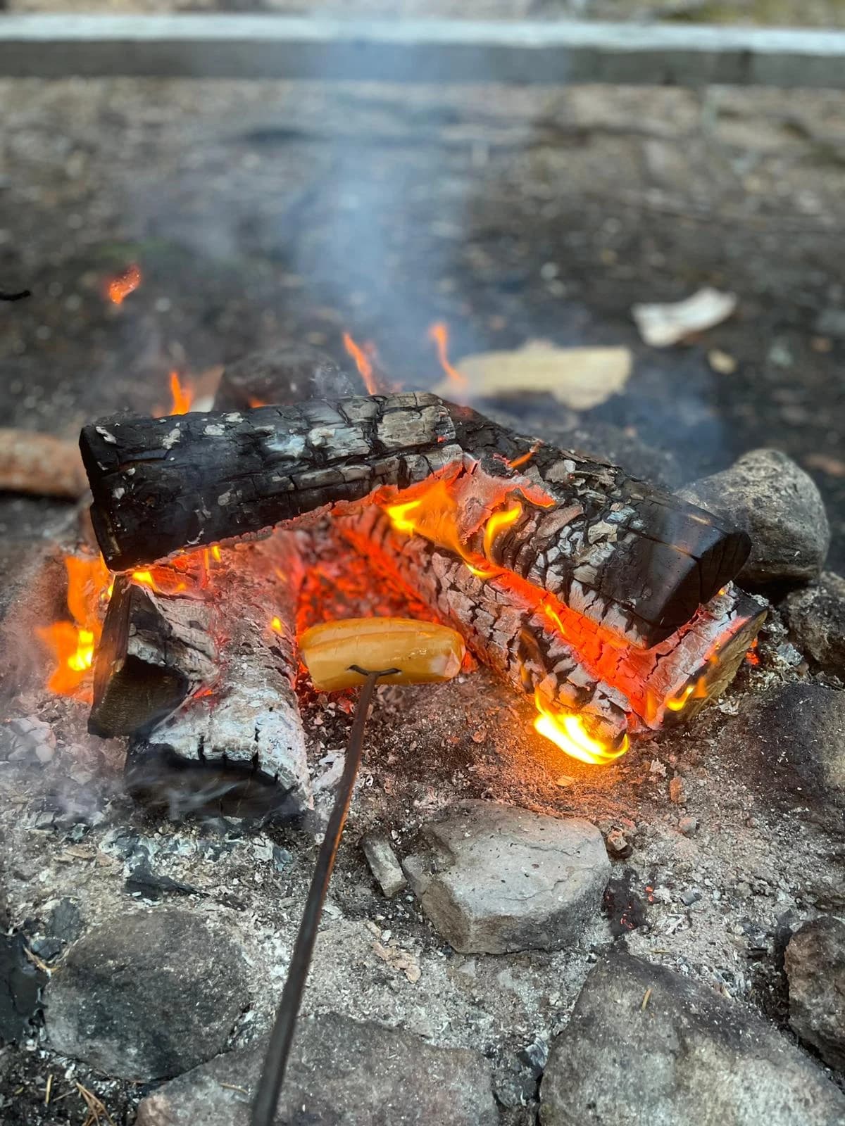 Sausage being made on fire