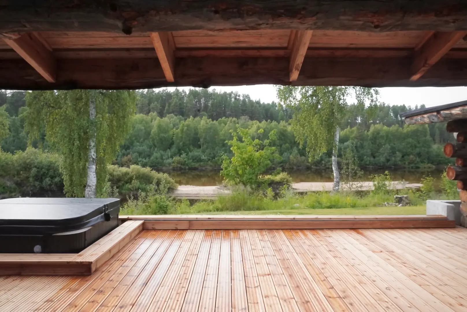 Hot tub on terrace with river views