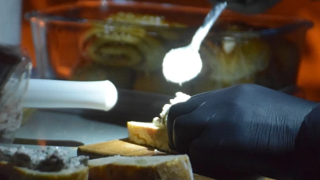 A man preparing luxury finnish snacks